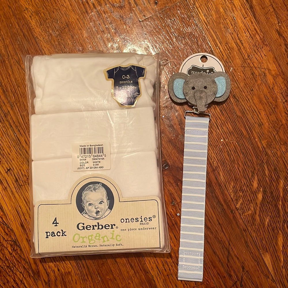 1 pack (4 in the pack) Gerber Onesies (0-3 months) and a Mud Pie Pacifier Clip